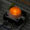 כפתור 12 מ"מ עם לד כתום